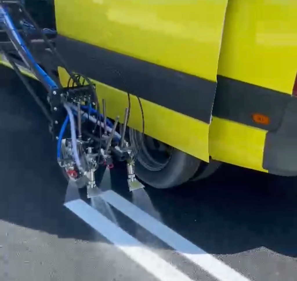 Road marking spray equipment mounted on service van