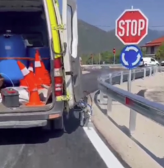 Marking van loaded with traffic cones at a newly built roundabout