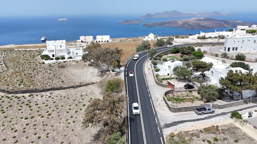 Coastal road marking project in a Mediterranean landscape
